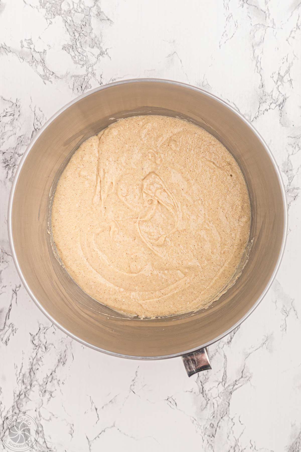 Blended cupcake batter in a mixing bowl.