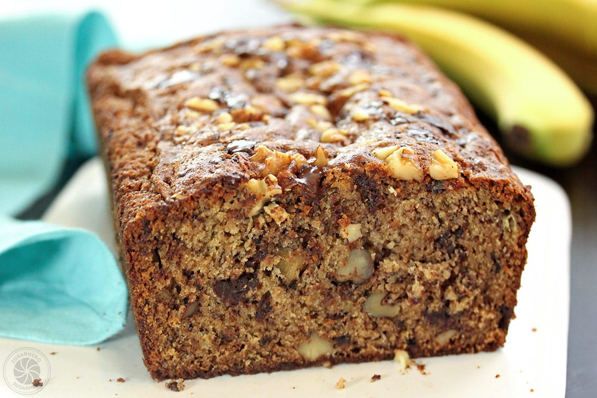 The Best Banana Bread | From SugarHero.com Close up of a slice of banana bread with the end cut off to see texture.