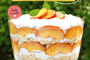 An image of peaches and cream trifle with text overlay for pinterest.