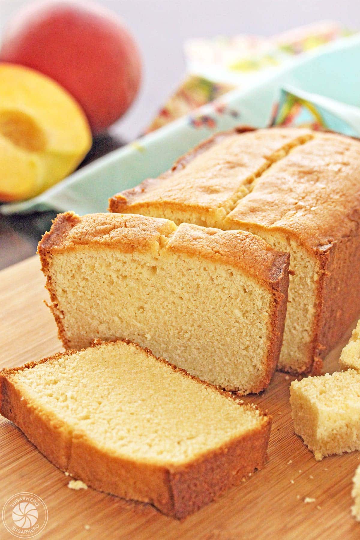 A pound cake with two slices cut off.